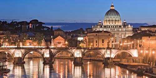 Vatican City and St Peter's Basilica from Ponte Sant'Angelo at the River Tiber, Rome Italy